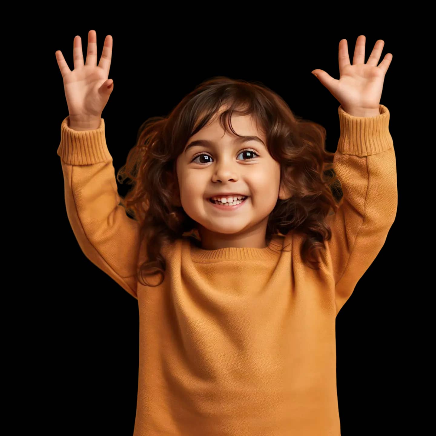 Child smiling in an orange sweater