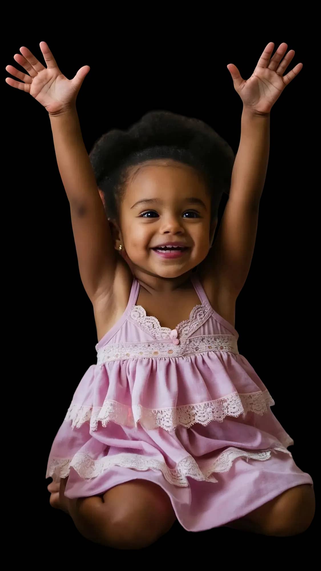 Child raising hands in a pink dress