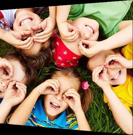 Children smiling together outdoors